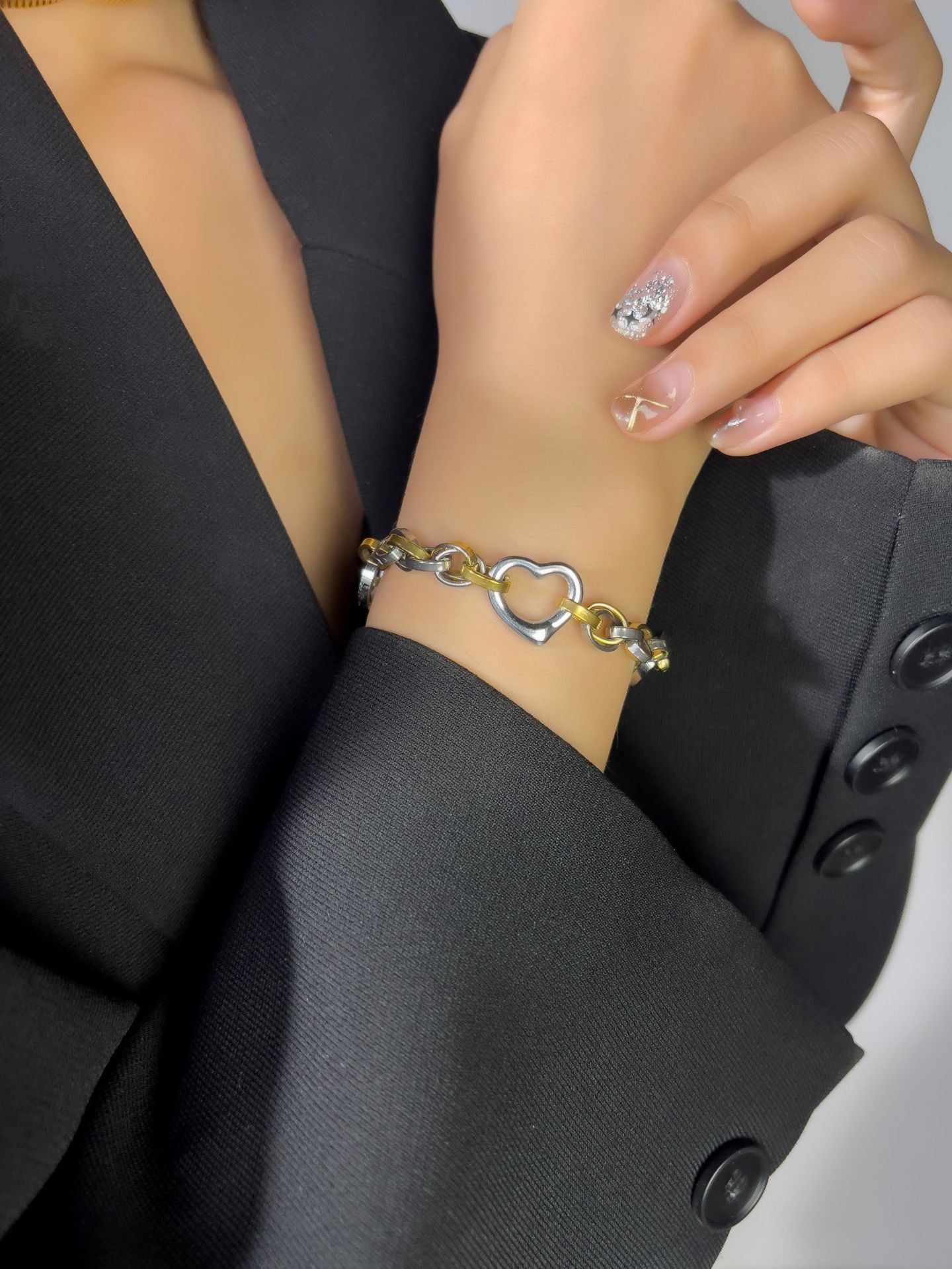 Wholesale Titanium steel gold-plated two-color hollow peach heart chain